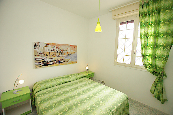 Villetta-caterina-schlafzimmer-grün-neu